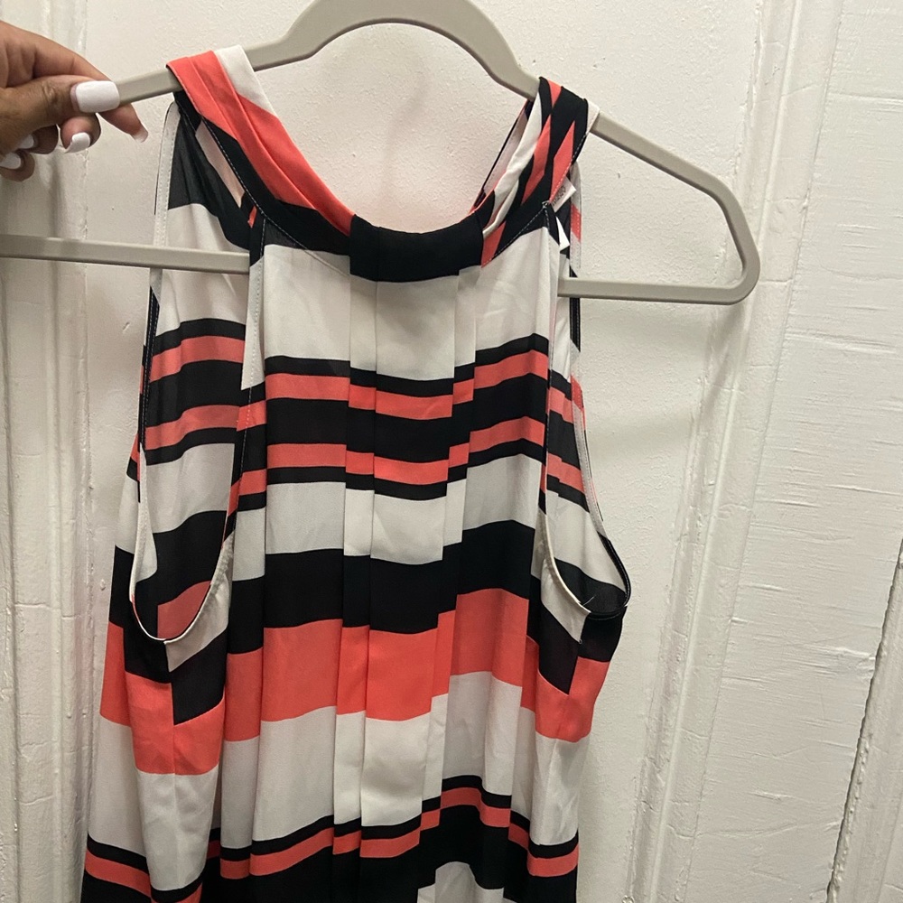 2 work blouses. 1 halter like
